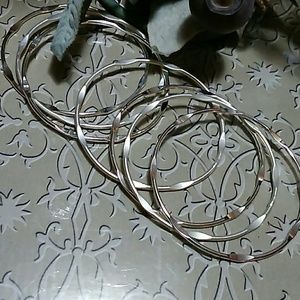 Silver toned bracelet set of 7